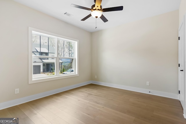 113 Summit View Ln, Ellijay, GA 30540 - empty room with a ceiling fan, wood finished floors, and baseboards