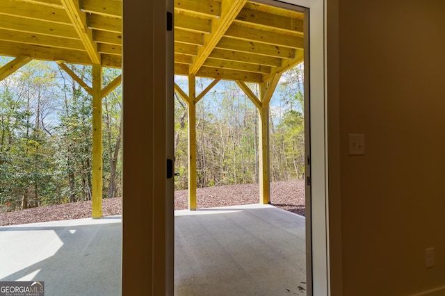 113 Summit View Ln, Ellijay, GA 30540 - entryway with carpet and beam ceiling
