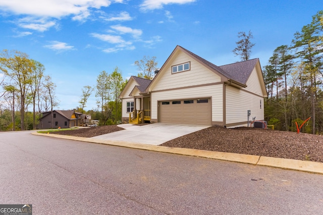 113 Summit View Ln, Ellijay, GA 30540 - view of front of home with concrete driveway, an attached garage, and a shingled roof