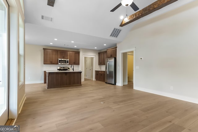 113 Summit View Ln, Ellijay, GA 30540 - kitchen with stainless steel appliances, open floor plan, ceiling fan, light countertops, and recessed lighting