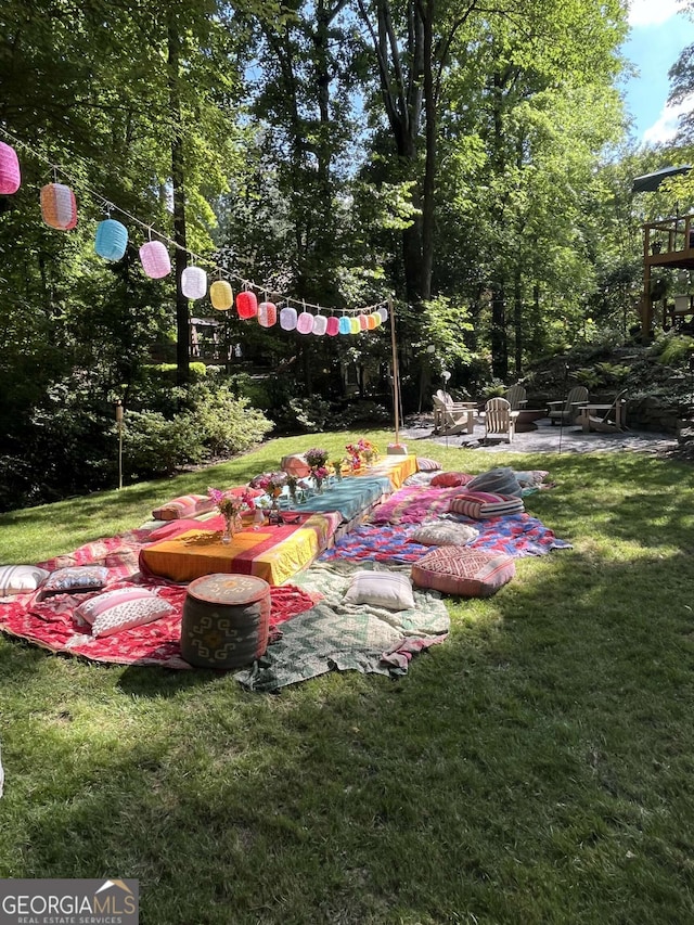 3146 Weymouth Dr, Marietta, GA 30062 - view of grassy yard featuring a patio