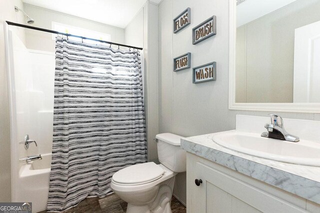 1208 Nease Rd, Guyton, GA 31312 - bathroom featuring vanity and toilet
