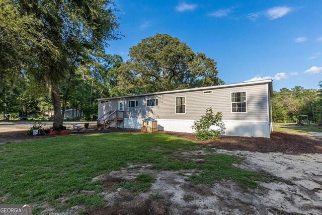 1208 Nease Rd, Guyton, GA 31312 - view of front of home with a front yard