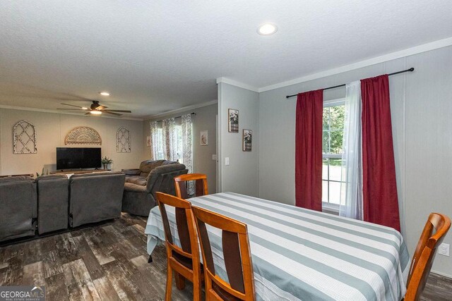 1208 Nease Rd, Guyton, GA 31312 - dining area with dark wood-type flooring, plenty of natural light, crown molding, a textured ceiling, and ceiling fan