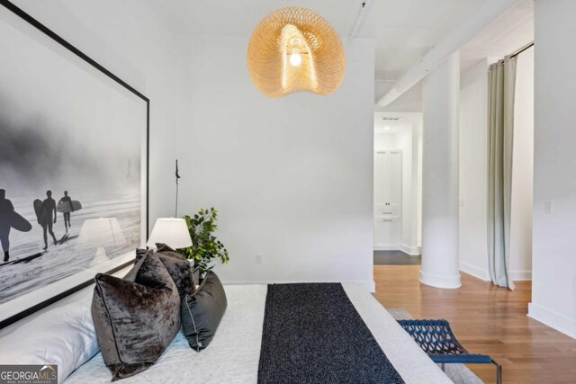 1058 Piedmont Ave Unit 103, Atlanta, GA 30309 - hallway featuring wood finished floors and baseboards