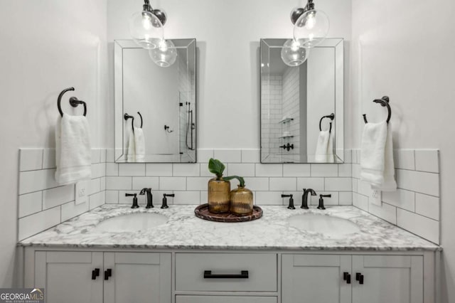 1058 Piedmont Ave Unit 103, Atlanta, GA 30309 - bathroom featuring backsplash and double vanity