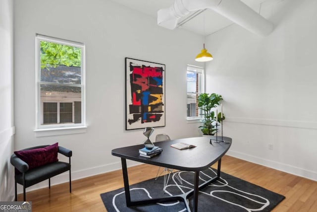 1058 Piedmont Ave Unit 103, Atlanta, GA 30309 - office area with wood finished floors and baseboards