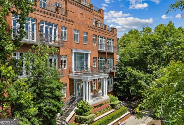 1058 Piedmont Ave Unit 103, Atlanta, GA 30309 - back of house featuring brick siding