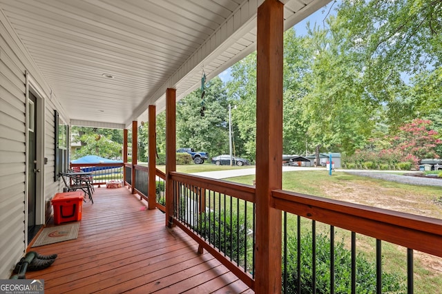 53 Jackson Cir, Cleveland, GA 30528 - porch featuring view of scattered trees and a yard