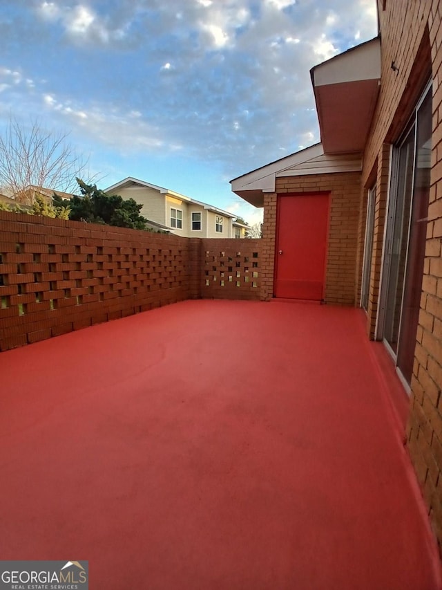 102 Westcliff Ctr Unit D, Warner Robins, GA 31093 - view of patio with fence