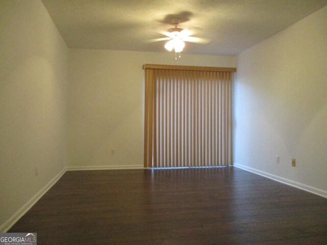 102 Westcliff Ctr Unit D, Warner Robins, GA 31093 - spare room with wood finished floors, ceiling fan, and baseboards