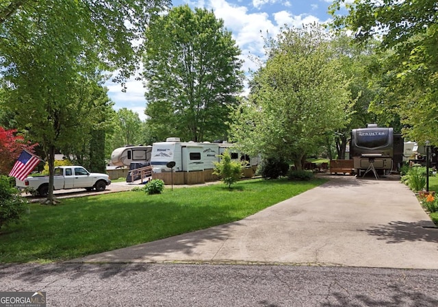 86 Moccasin Ln Unit 16, Blairsville, GA 30512 - view of green lawn with driveway