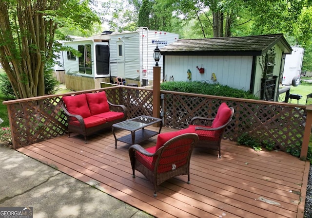 86 Moccasin Ln Unit 16, Blairsville, GA 30512 - wooden terrace with outdoor lounge area