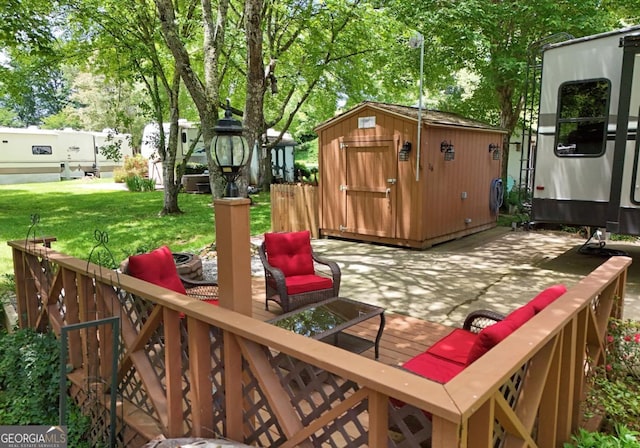 86 Moccasin Ln Unit 16, Blairsville, GA 30512 - view of jungle gym with a storage shed, an outbuilding, and a lawn