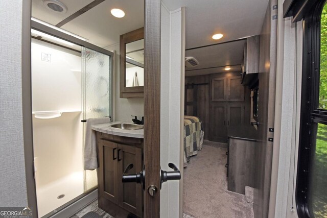 86 Moccasin Ln Unit 16, Blairsville, GA 30512 - bathroom with a shower stall and vanity