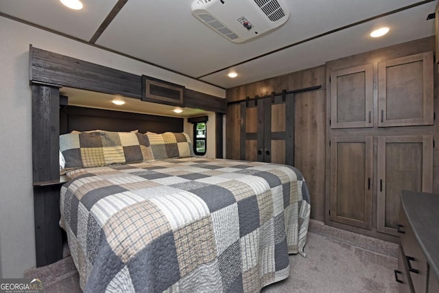 86 Moccasin Ln Unit 16, Blairsville, GA 30512 - bedroom featuring a barn door, carpet, and recessed lighting