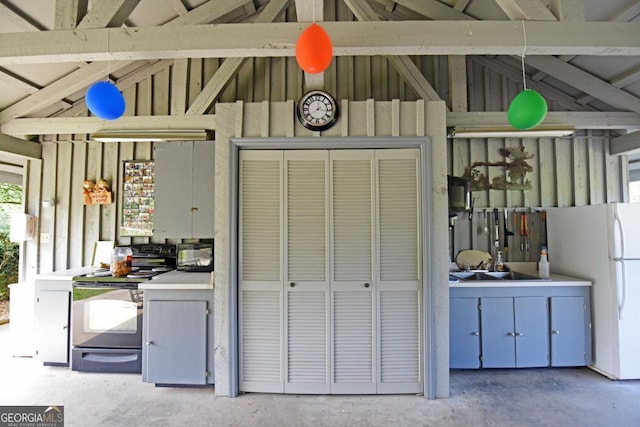 86 Moccasin Ln Unit 16, Blairsville, GA 30512 - garage featuring a sink and freestanding refrigerator