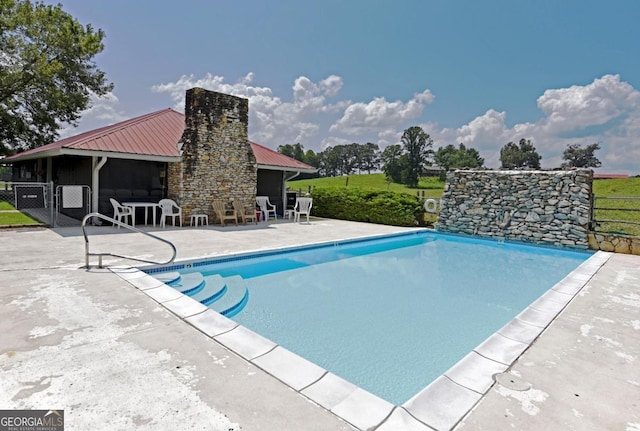 86 Moccasin Ln Unit 16, Blairsville, GA 30512 - swimming pool with a patio area and fence