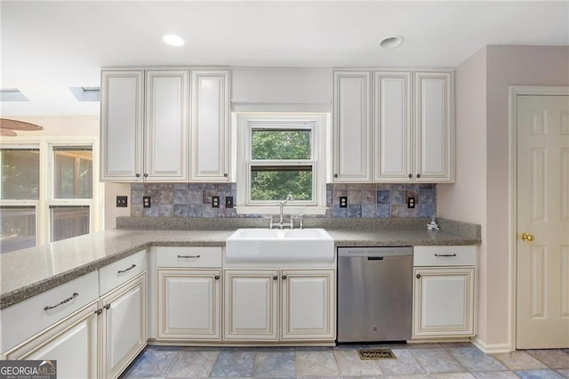 106 Waterford Pl, Acworth, GA 30101 - kitchen with dishwasher, a sink, tasteful backsplash, and baseboards