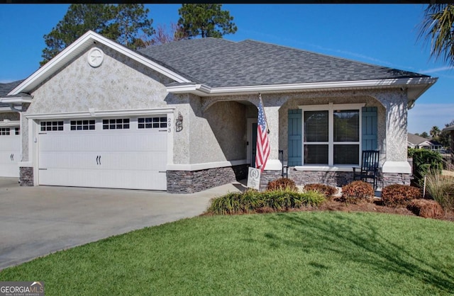 293 Laurel Landing Blvd, Kingsland, GA 31548 - view of front facade with an attached garage, concrete driveway, a front yard, and roof with shingles