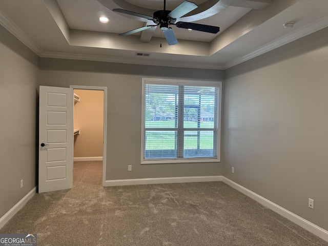 293 Laurel Landing Blvd, Kingsland, GA 31548 - carpeted empty room with a raised ceiling, ceiling fan, ornamental molding, baseboards, and a smoke detector