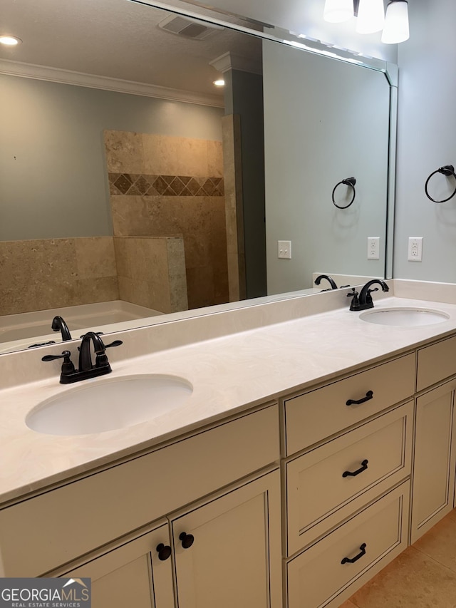293 Laurel Landing Blvd, Kingsland, GA 31548 - bathroom with double vanity, crown molding, tile patterned flooring, and a bathtub