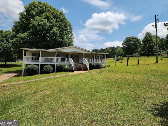 715 Bailey Jester Rd, Griffin, GA 30224 - view of front of property with a porch and a front yard