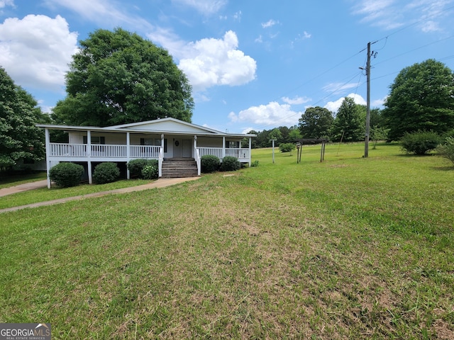 715 Bailey Jester Rd, Griffin, GA 30224 - view of front of home featuring a porch and a front lawn
