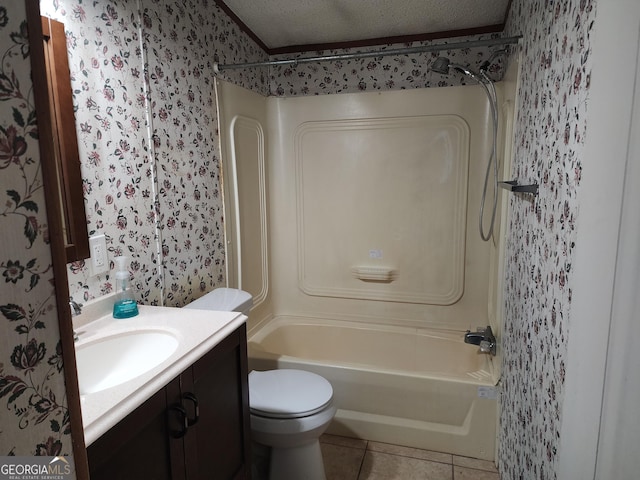 715 Bailey Jester Rd, Griffin, GA 30224 - full bathroom featuring wallpapered walls, toilet, washtub / shower combination, tile patterned flooring, and vanity