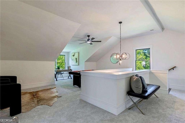 136 Beutell St, Norcross, GA 30071 - living room with vaulted ceiling, light colored carpet, baseboards, and a ceiling fan