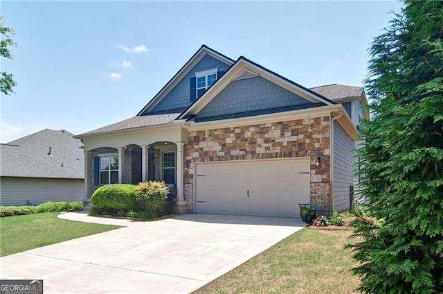 514 Creekshire Cir, Canton, GA 30115 - craftsman inspired home featuring stone siding, driveway, a garage, and a front lawn