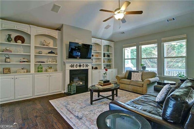 514 Creekshire Cir, Canton, GA 30115 - living area with a ceiling fan, dark wood finished floors, a glass covered fireplace, and vaulted ceiling
