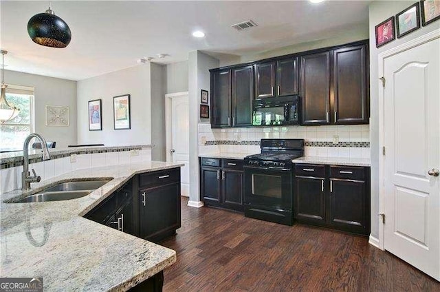 514 Creekshire Cir, Canton, GA 30115 - kitchen with black appliances, a sink, light stone counters, dark wood-type flooring, and recessed lighting