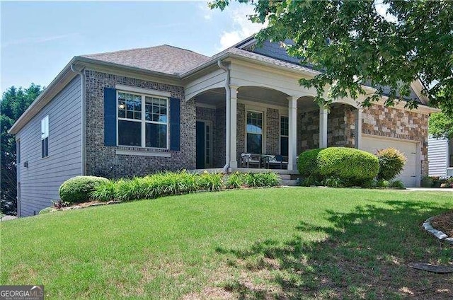 514 Creekshire Cir, Canton, GA 30115 - view of front of house with covered porch, a garage, and a front lawn