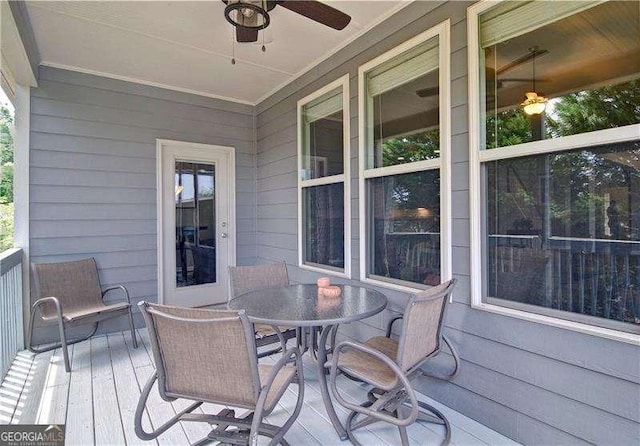 514 Creekshire Cir, Canton, GA 30115 - wooden terrace featuring ceiling fan and outdoor dining area