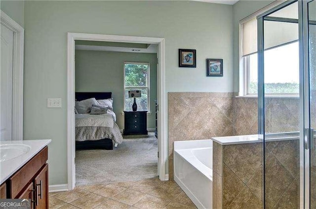 514 Creekshire Cir, Canton, GA 30115 - full bathroom featuring tile patterned flooring, connected bathroom, a bath, and vanity