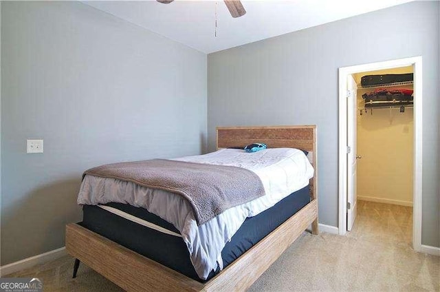 514 Creekshire Cir, Canton, GA 30115 - bedroom featuring carpet, a spacious closet, baseboards, a ceiling fan, and a closet