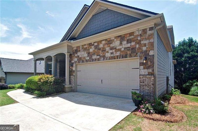 514 Creekshire Cir, Canton, GA 30115 - view of front of property with stone siding, driveway, and a garage