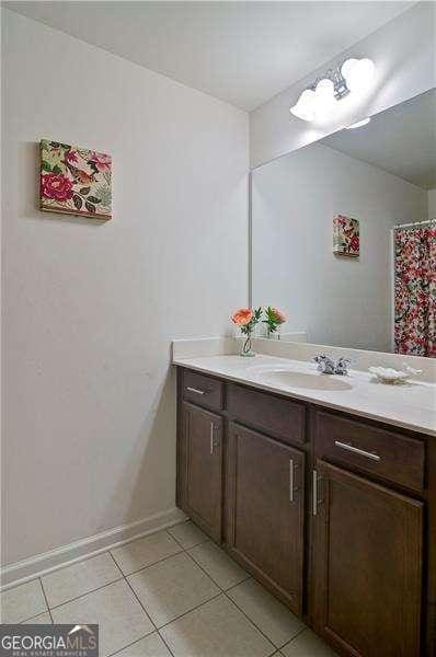 514 Creekshire Cir, Canton, GA 30115 - bathroom featuring tile patterned floors, vanity, and baseboards