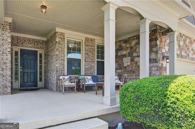 514 Creekshire Cir, Canton, GA 30115 - view of exterior entry with a porch and brick siding
