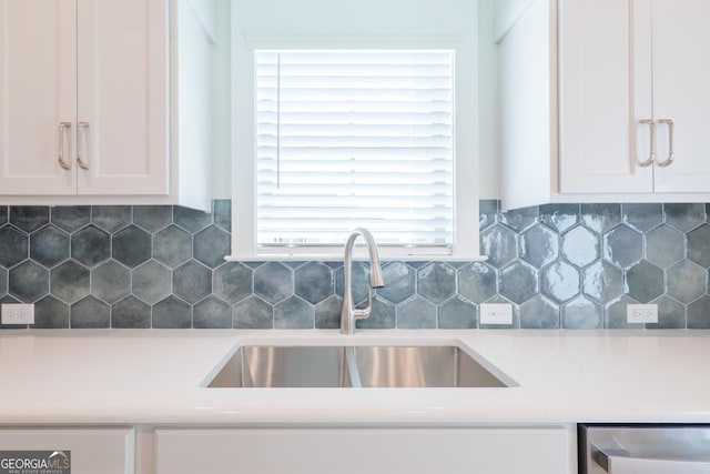 3916 Bull Run, Valdosta, GA 31605 - kitchen featuring a sink, white cabinetry, light countertops, decorative backsplash, and dishwasher
