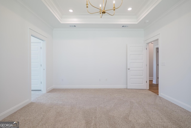 3916 Bull Run, Valdosta, GA 31605 - unfurnished room with a chandelier, carpet floors, ornamental molding, a tray ceiling, and recessed lighting