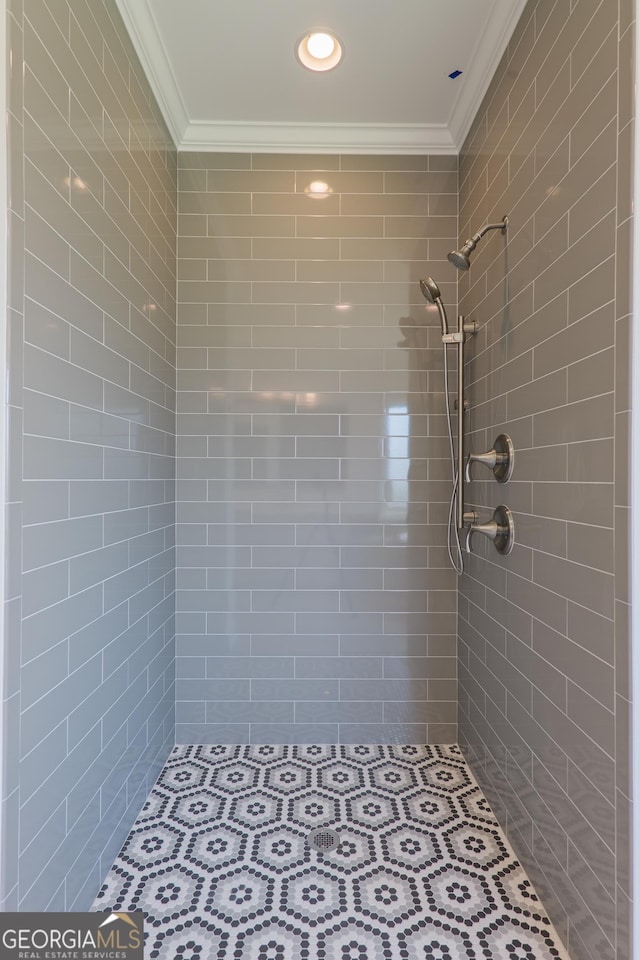 3916 Bull Run, Valdosta, GA 31605 - bathroom with ornamental molding and a tile shower