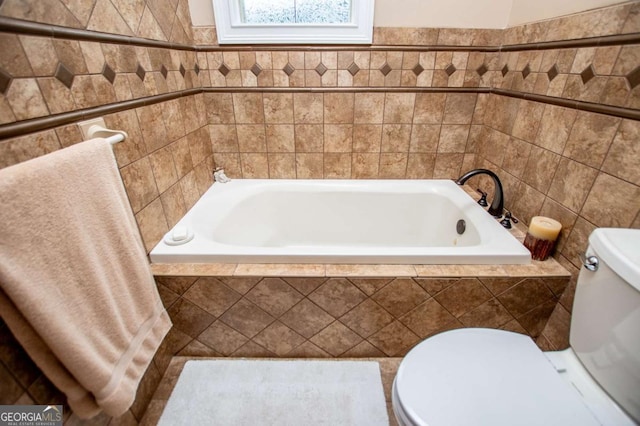 98 Sweetbriar Ln, Carrollton, GA 30117 - full bath featuring tile walls, toilet, and tiled bath