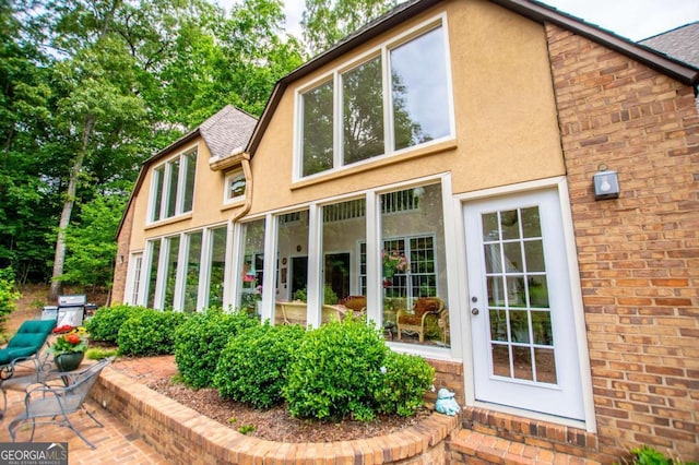 98 Sweetbriar Ln, Carrollton, GA 30117 - view of property exterior with stucco siding