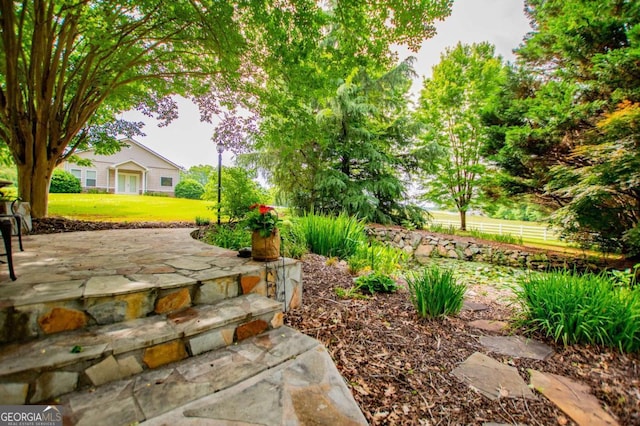 98 Sweetbriar Ln, Carrollton, GA 30117 - view of yard featuring a patio