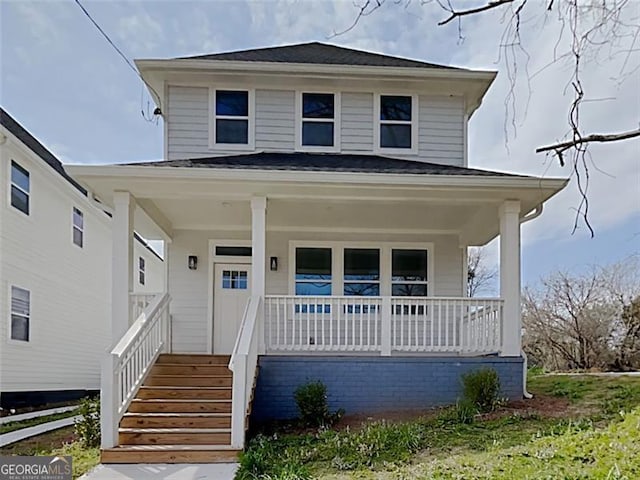 629 Windsor St, Atlanta, GA 30312 - traditional style home featuring a porch and a shingled roof