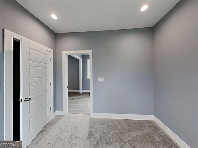 629 Windsor St, Atlanta, GA 30312 - carpeted empty room with baseboards and recessed lighting