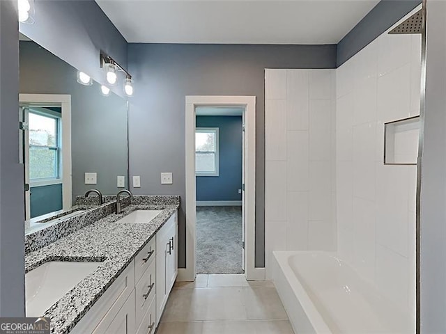 629 Windsor St, Atlanta, GA 30312 - bathroom featuring tile patterned floors, double vanity, and shower / bath combination