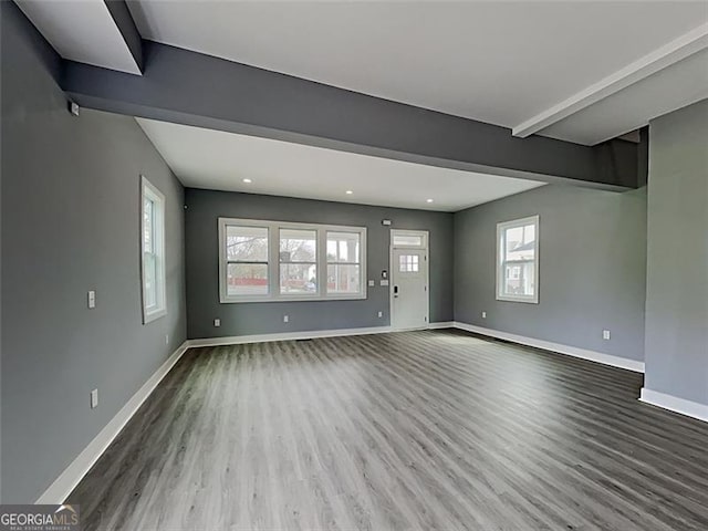 629 Windsor St, Atlanta, GA 30312 - unfurnished living room with wood finished floors, plenty of natural light, recessed lighting, and beamed ceiling